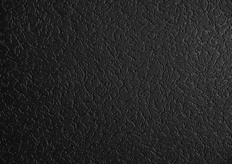 Black pattern textured leather background.