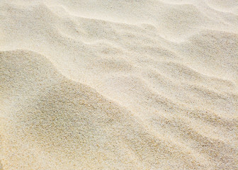 Fototapeta na wymiar Sand on the beach as background