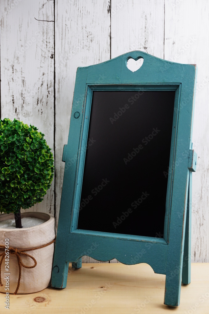 Wall mural space blackboard on wooden background