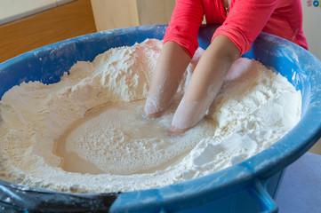 Making homemade cheese.