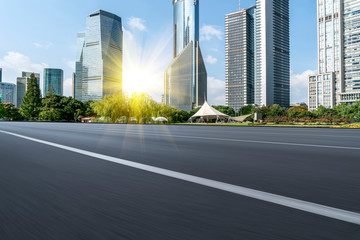 Fototapeta premium Highway Road and Skyline of Modern Urban Buildings in Shanghai..