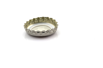 close up of a bottle cap isolated on white