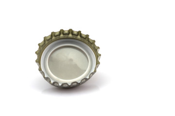 close up of a bottle cap isolated on white