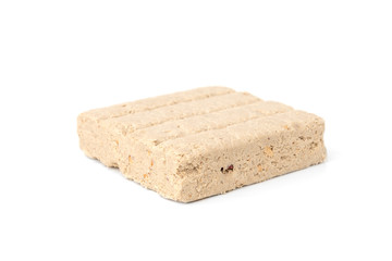 Halva with peanut isolated on white background.