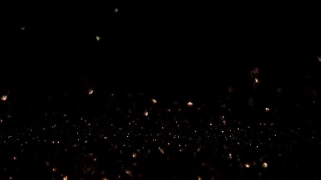 Dark glitter magic background. Defocused light and free focused place for your design.