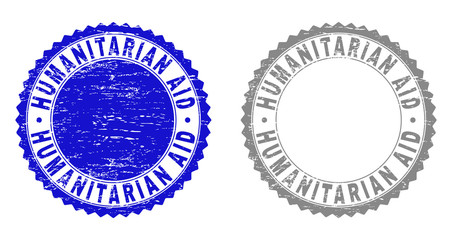 Grunge HUMANITARIAN AID stamp seals isolated on a white background. Rosette seals with grunge texture in blue and gray colors. Vector rubber watermark of HUMANITARIAN AID caption inside round rosette.