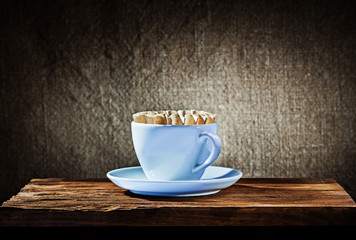 coffee cup with paper filter on vintage wood