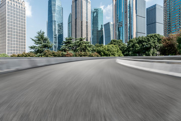 Obraz premium Highway Road and Skyline of Modern Urban Buildings in Shanghai..