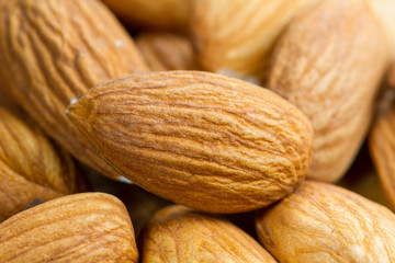 Almond on wood background