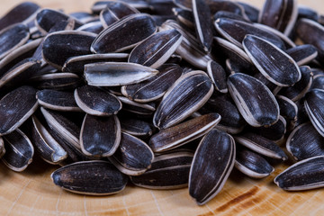 Sunflower seeds on a wooden background