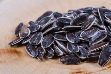 Sunflower seeds on a wooden background