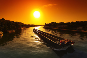 Fototapeta na wymiar Barge on Seine river in Paris center 