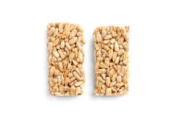 Sunflower seed kozinaki isolated on white background. Sweet bars with seeds and caramel. 