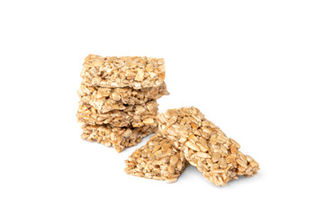 Sunflower seed kozinaki isolated on white background. Sweet bars with seeds and caramel. 