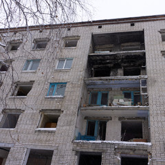 Old long abandoned and derelict brick house in city Celje