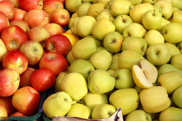 Fresh ripe red and green apples as background