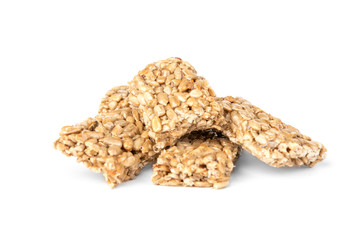 Sunflower seed kozinaki isolated on white background. Sweet bars with seeds and caramel. 