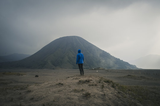 Man standing in front of Mount Bromo