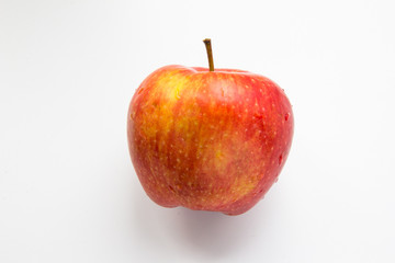 One whole apple fruit at white background