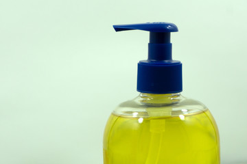 Set of different bottles for beauty, hygiene and health on a white background with reflection, they shampoo, conditioner and other hair products