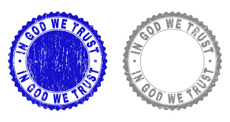Grunge IN GOD WE TRUST stamp seals isolated on a white background. Rosette seals with grunge texture in blue and gray colors. Vector rubber watermark of IN GOD WE TRUST caption inside round rosette.