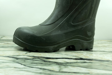 Black warm feminine boots Winter shoes isolated on white background