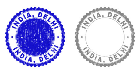 Grunge INDIA, DELHI stamp seals isolated on a white background. Rosette seals with grunge texture in blue and grey colors. Vector rubber stamp imprint of INDIA, DELHI tag inside round rosette.