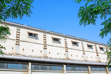 white workshop under blue sky