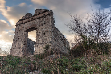 A shot from below of an abandoned church on a hill in the province of Salerno, southern Italy