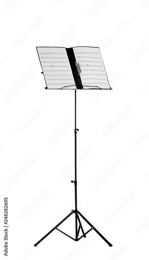 Wall mural Note stand with music sheets on white background