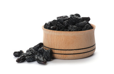 Bowl with raisins on white background. Healthy dried fruit
