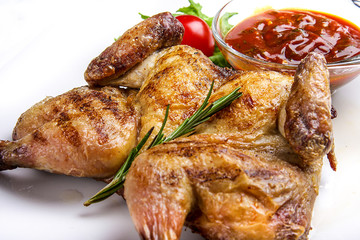 Grilled fried roast chicken with hot sausage