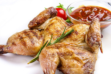 Grilled fried roast chicken with hot sausage