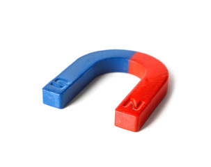Red and blue horseshoe magnet isolated on white