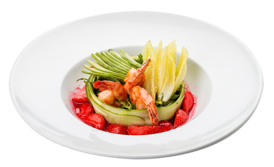 Salad with shrimp, avocado and strawberries on a white background.