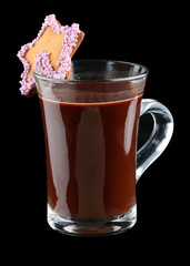 Cocoa ginger cookies in a Cup on a dark background