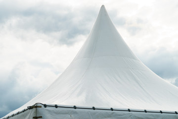 Spiked roof of white party event tent