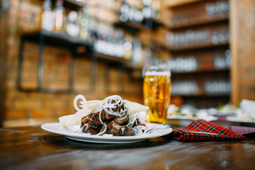 shish kebab with onion on the plate