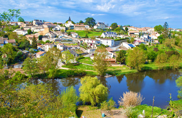 View on a French village across Thouet river
