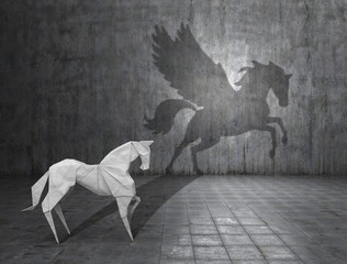 Concept of hidden potential. A paper figure of a horse that fills the shadow of a pegasus. 3D illustration