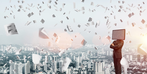 Businessman with TV instead of head.