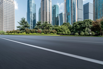 Obraz premium Highway Road and Skyline of Modern Urban Buildings in Shanghai..