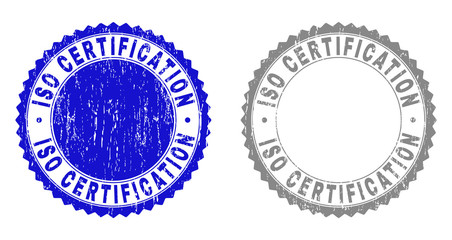 Grunge ISO CERTIFICATION stamp seals isolated on a white background. Rosette seals with grunge texture in blue and gray colors.