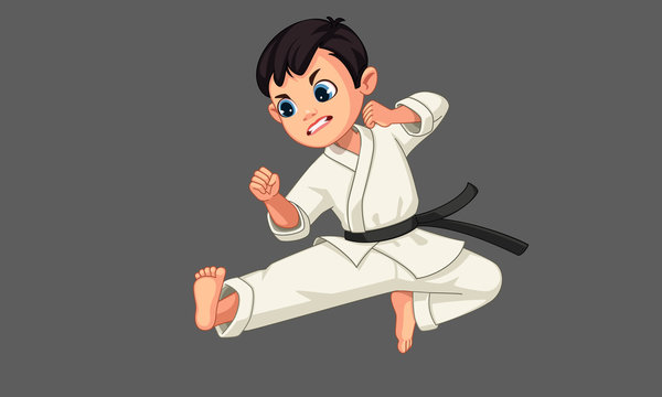 Cute little karate boy in karate pose 2