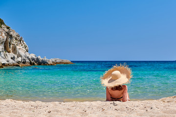 Fototapeta na wymiar Woman in bikini on beach