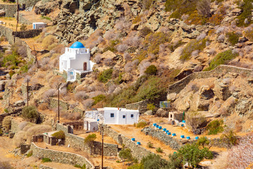 A small chapel built on the rocks on the island of Sifnos. Cyclades, Greece