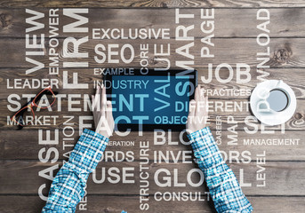 Close view of woman in checked shirt at her workplace