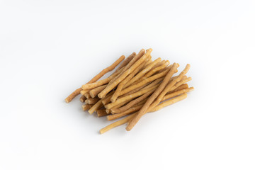 Natural toothbrush Miswak (Kayu Sugi) on white background with selective focus. It is a teeth cleaning twig made from the Salvadora persica tree and also know as miswaak, siwak, Sugi or sewak