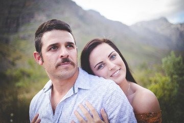 Obraz premium Close up image of a loving couple spending time in nature and being loving together