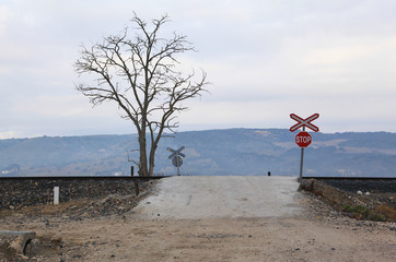 railway crossing in winter near Ronda in Andalusia, Spain